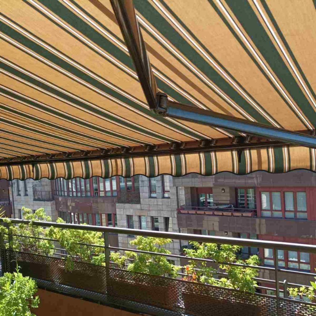 toldo brazo extensible o articulado